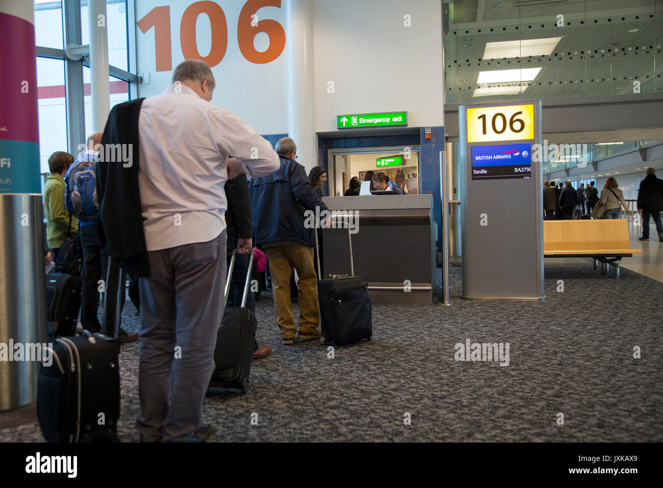 Passengers at departure boarding gate, Gatwick airport north terminal