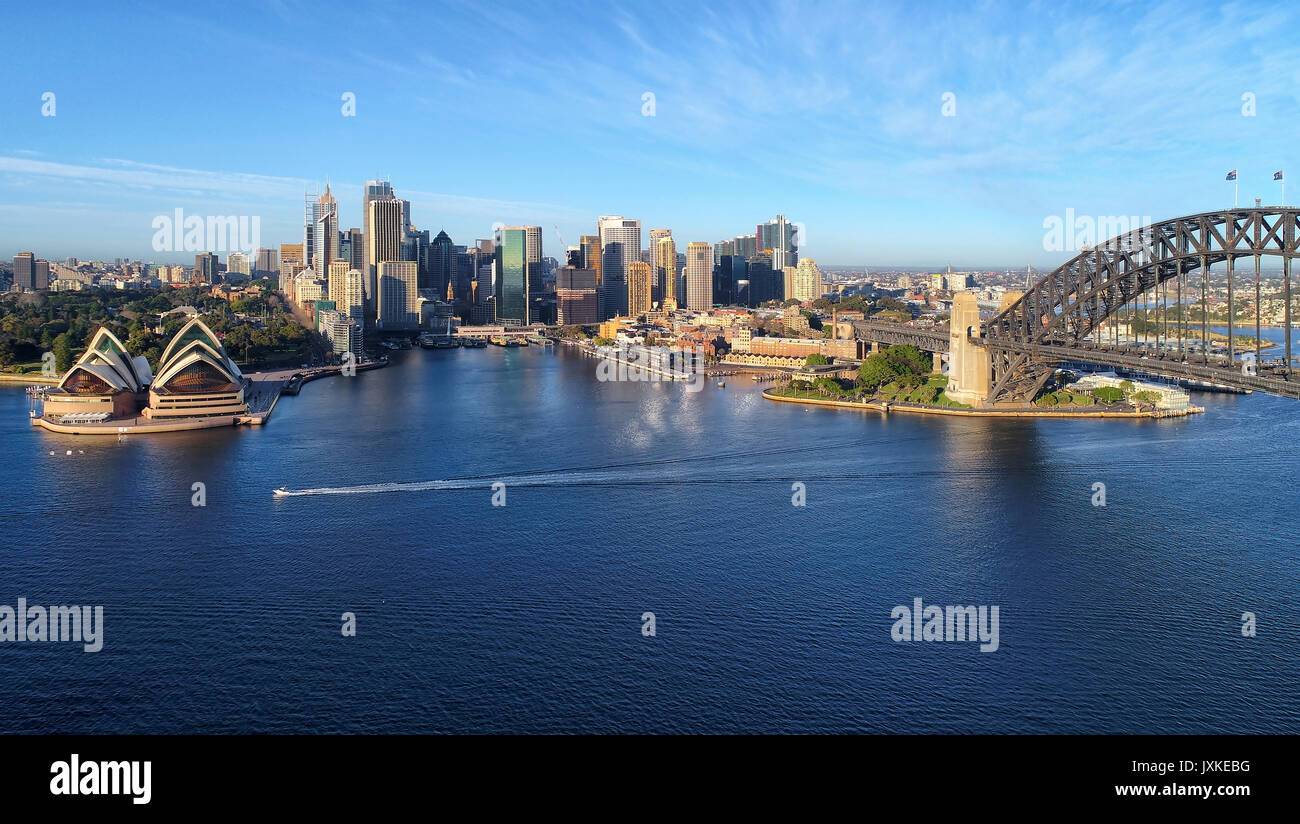 Aerial  panorama of Sydney city landmarks across Harbour from the Harbour bridge to CBD, circular quay and domain. Stock Photo