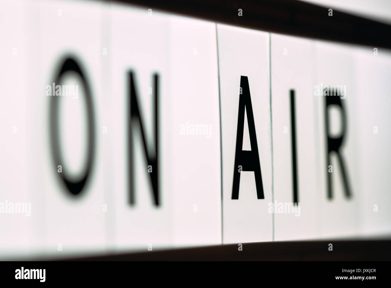 Vintage On Air live broadcast sign in radio or television studio blinking Stock Photo