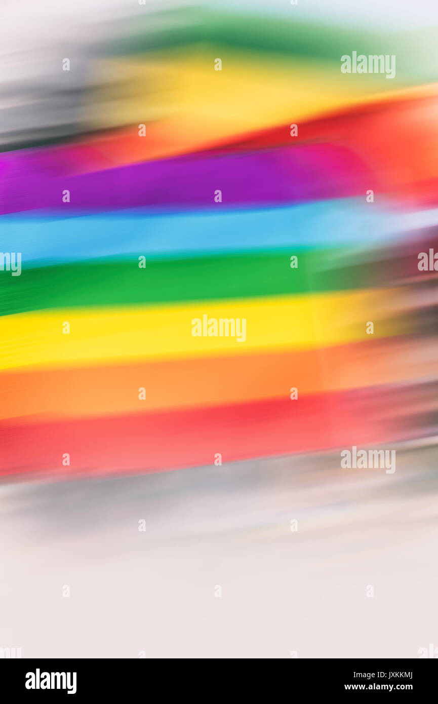 Motion blurred picture of a gay rainbow flag during pride parade. Concept of LGBT rights. Stock Photo