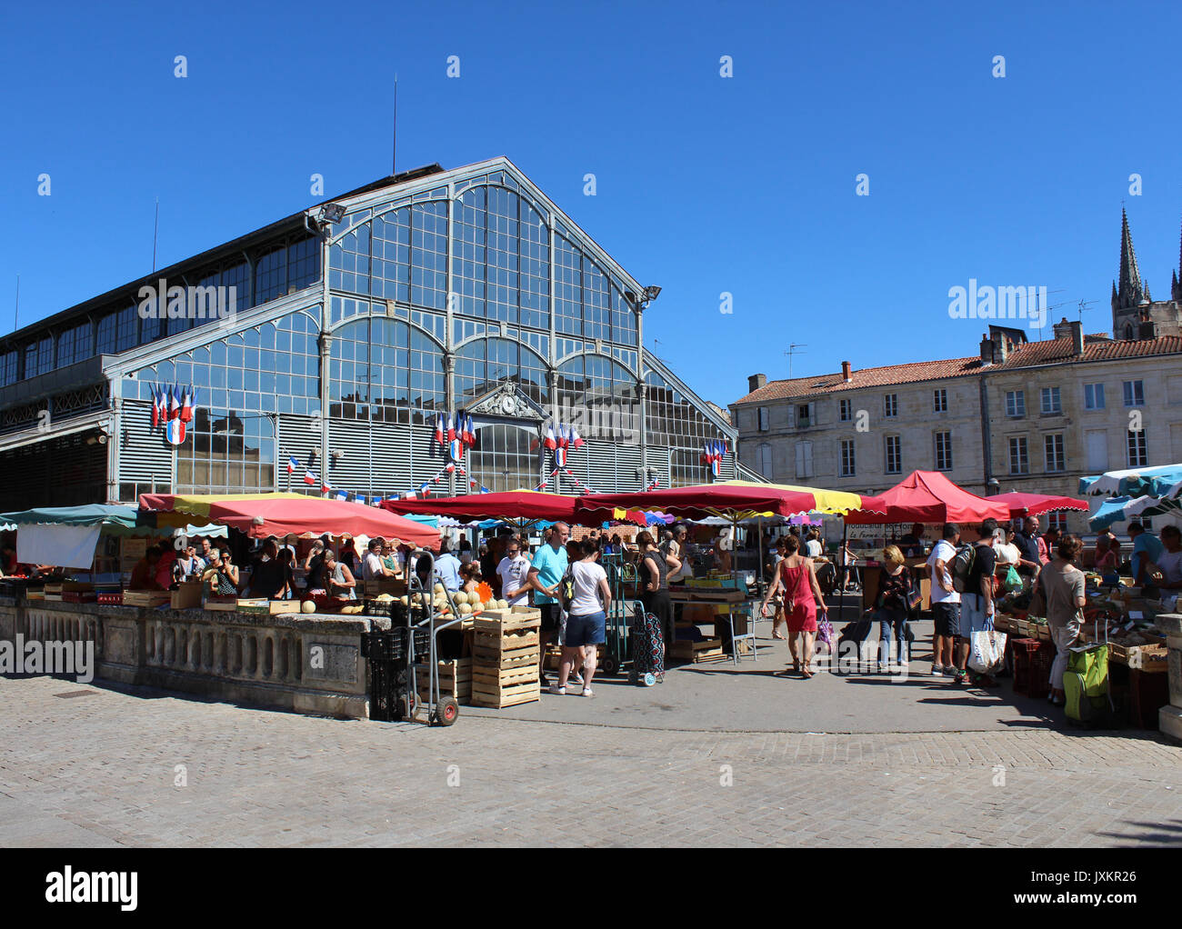 NIORT, FRANCE, JULY 16 2017: View of the colorful Sunday local produce market and Place de Halles in Niort, a town in the Deux-Sevres region of wester Stock Photo