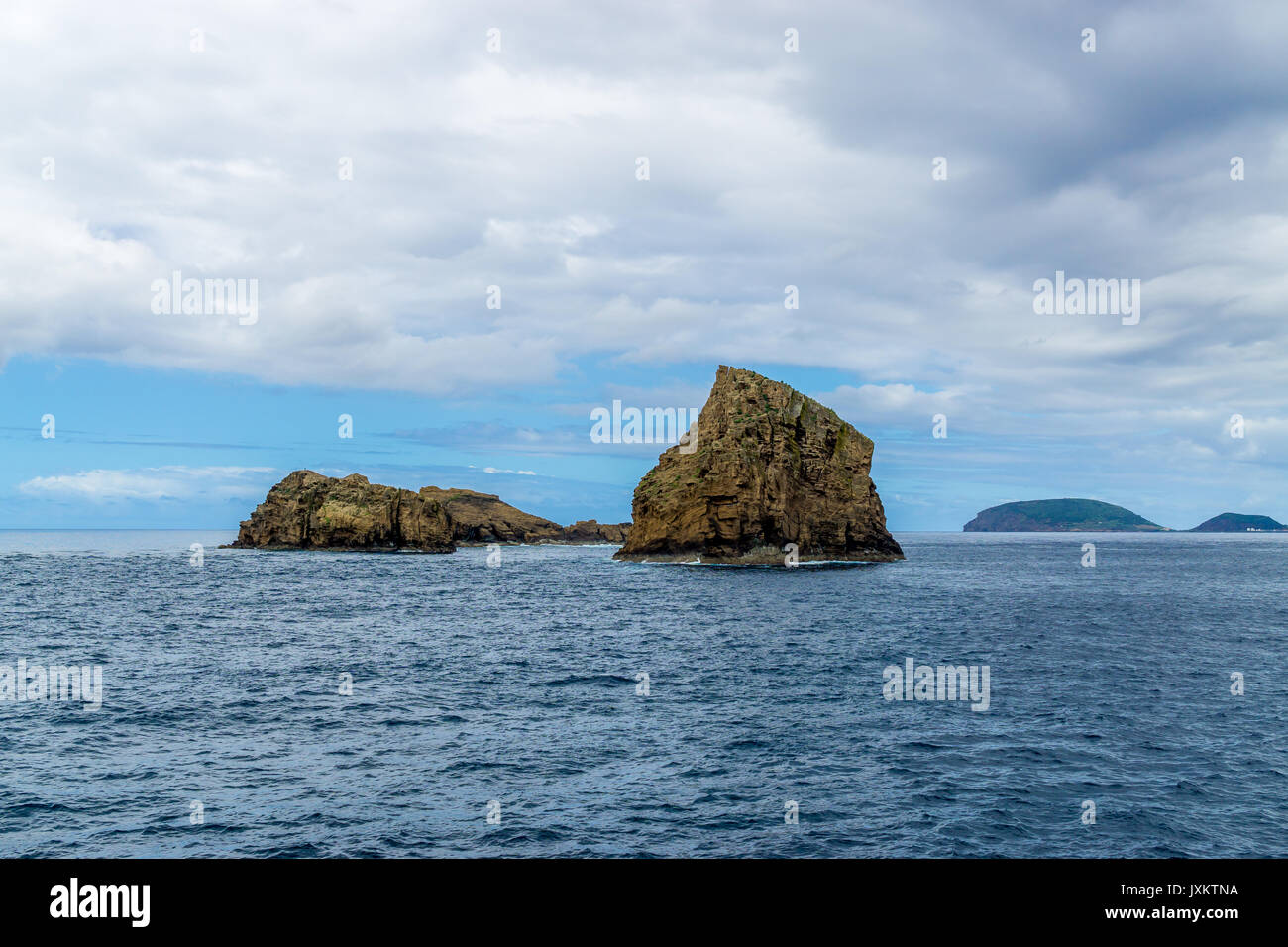 Ilheus da Madalena (Magdalena islets) near Pico island, Azores Stock Photo