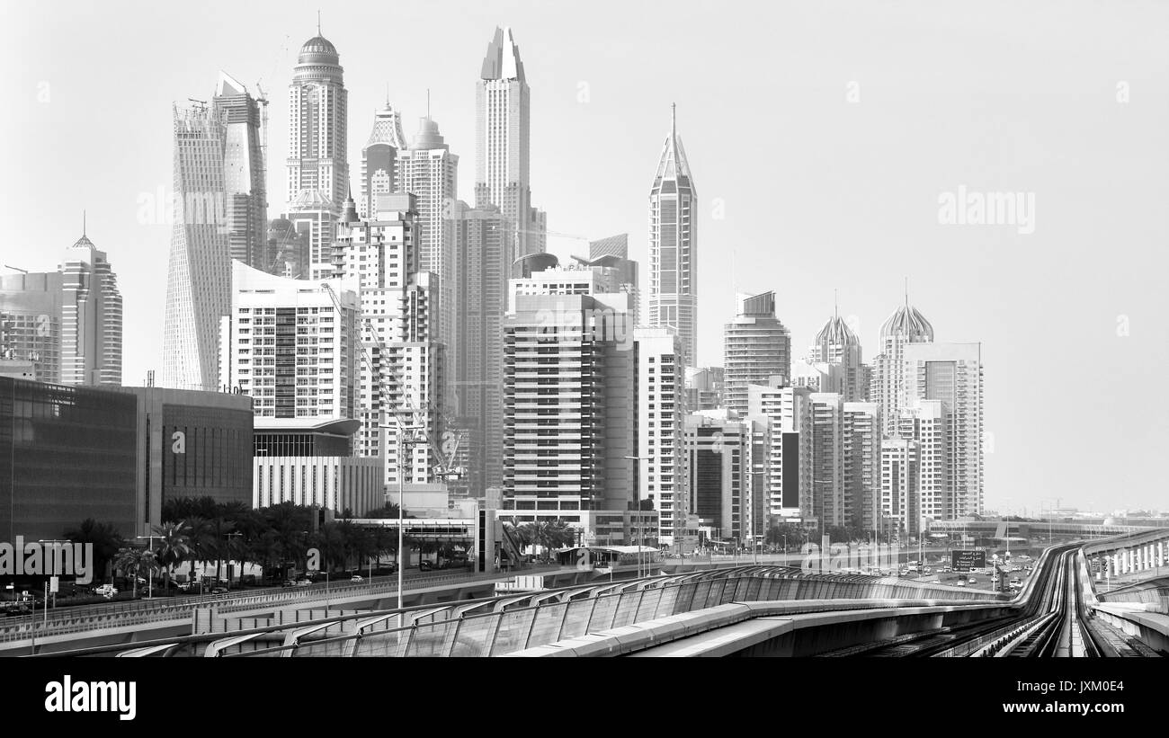 Old black and white film style picture of Dubai skyline, United Arab Emirates. Stock Photo
