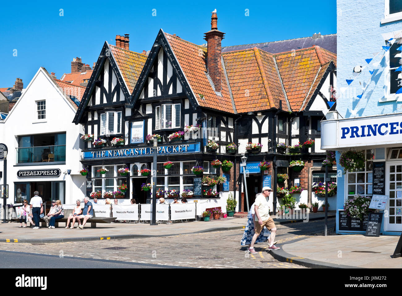The Newcastle Packet Inn pub exterior in summer South Bay Scarborough seafront North Yorkshire England UK United Kingdom GB Great Britain Stock Photo