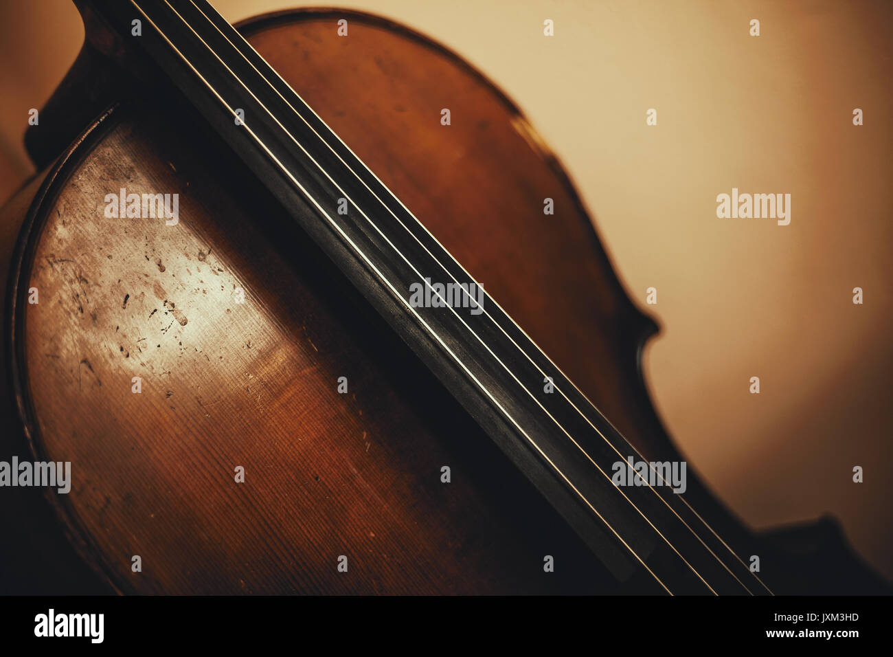 Closeup of an old cello, body and neck part. Stock Photo