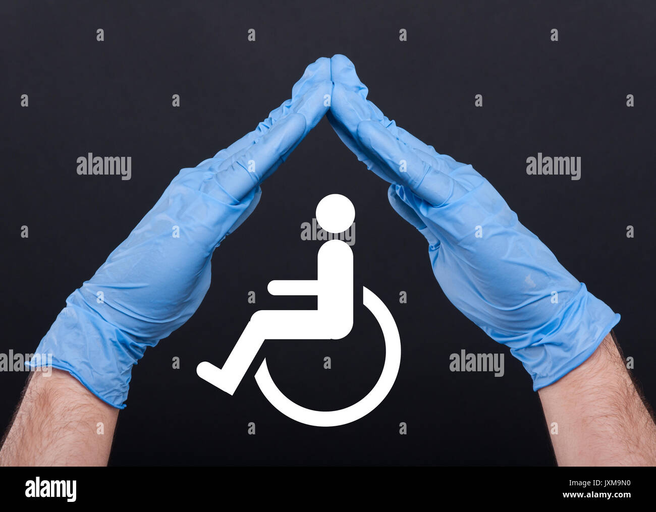 Conceptual image of help and care for handicapped person isolated on