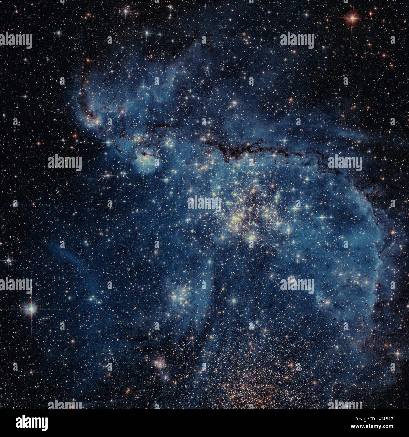 The Small Magellanic Cloud is a dwarf irregular galaxy near the Milky Way, located 210,000 light-years away. Retouched colored image. Elements of this Stock Photo