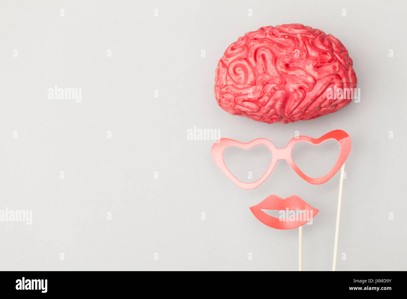 Human brain with comedy props Stock Photo - Alamy