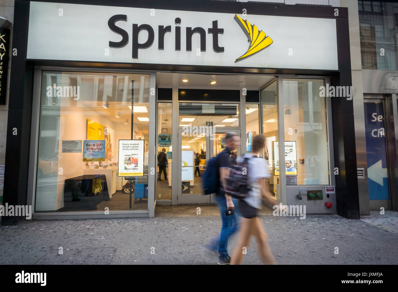 A Sprint store in the Herald Square neighborhood in New York on Tuesday, August 8, 2017. SoftBank, parent of Sprint,  is reported to be exploring  a takeover of Charter Communications, a cable provider. (© Richard B. Levine) Stock Photo