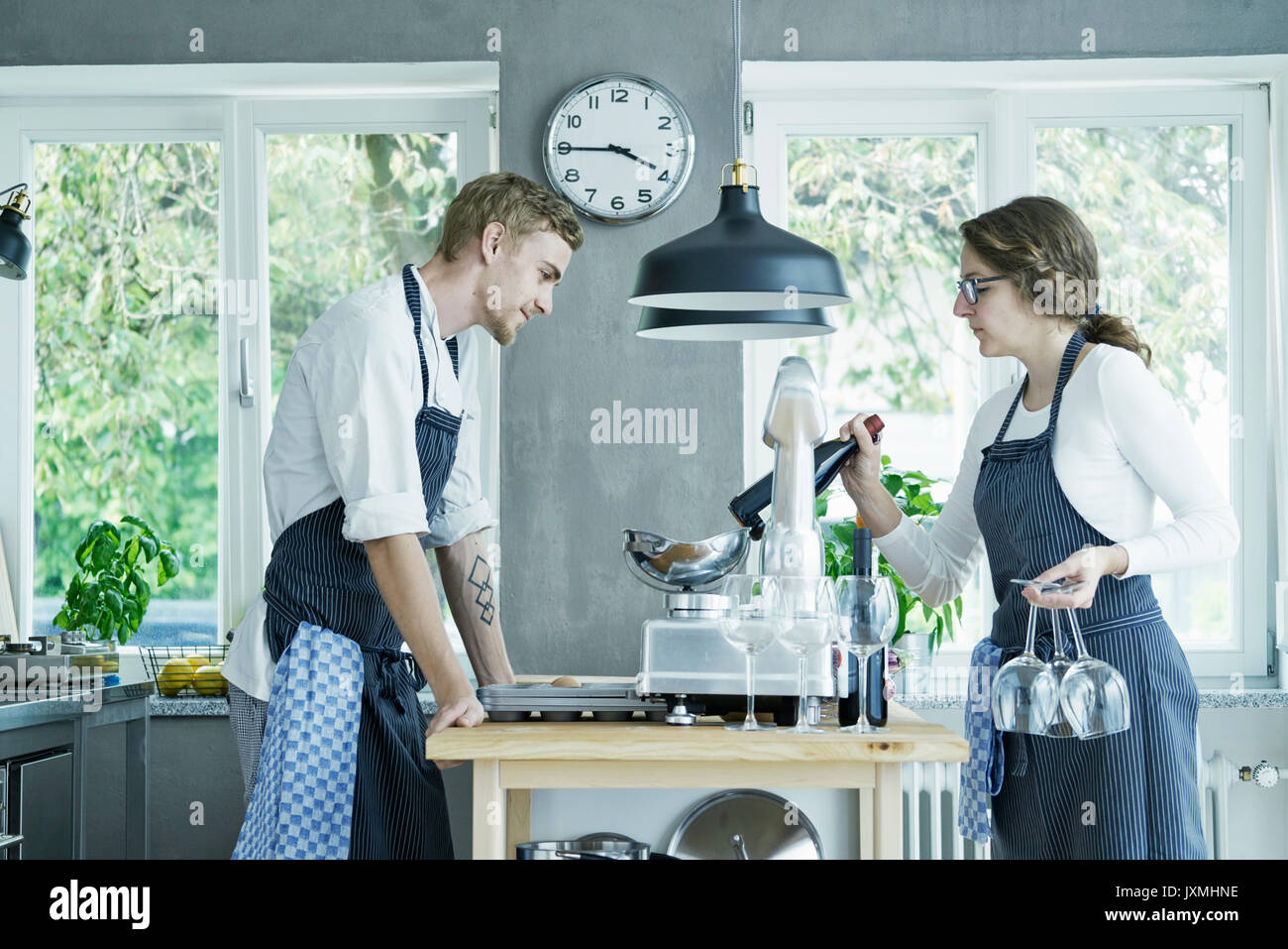 Two caterers preparing for event Stock Photo
