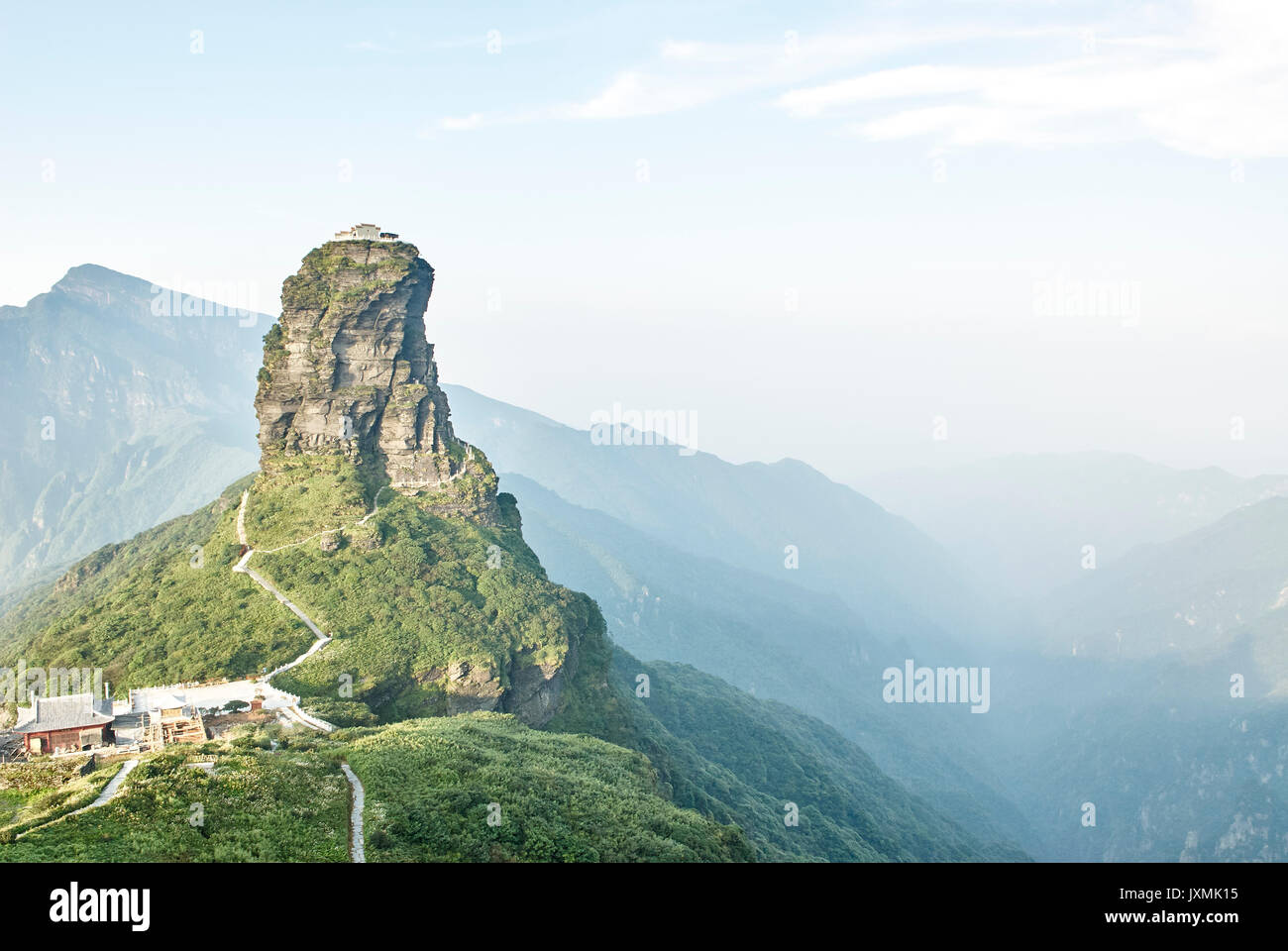 Elevated view of Mount Fanjing rock formation and misty landscape, Jiangkou, Guizhou, China Stock Photo