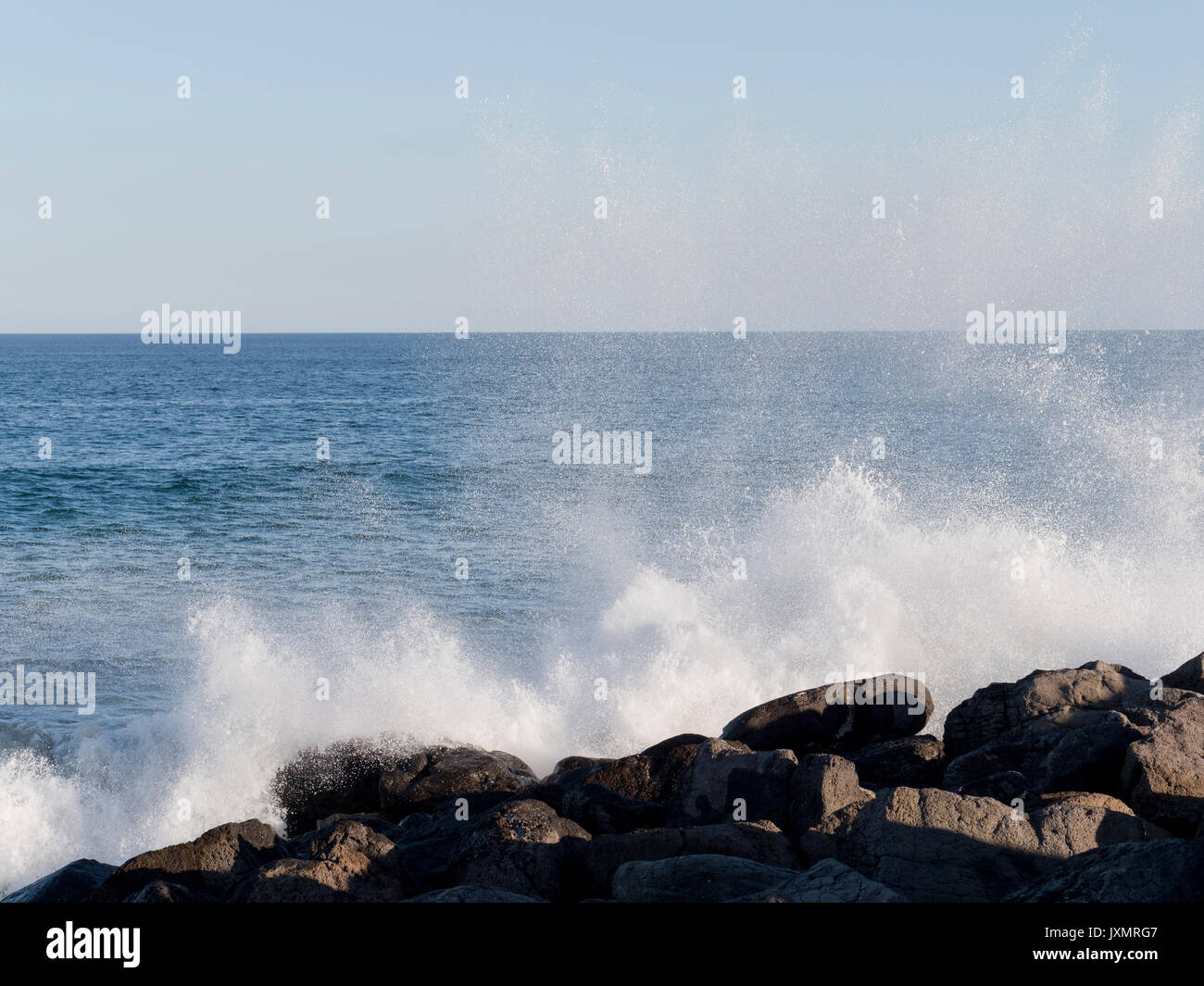 Ocean waves crashing on rocks, Torquay, Victoria, Australia, Oceania Stock Photo