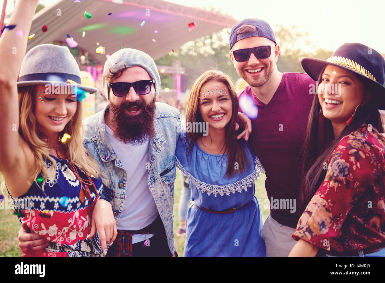 Portrait of young adult friends having fun at festival Stock Photo