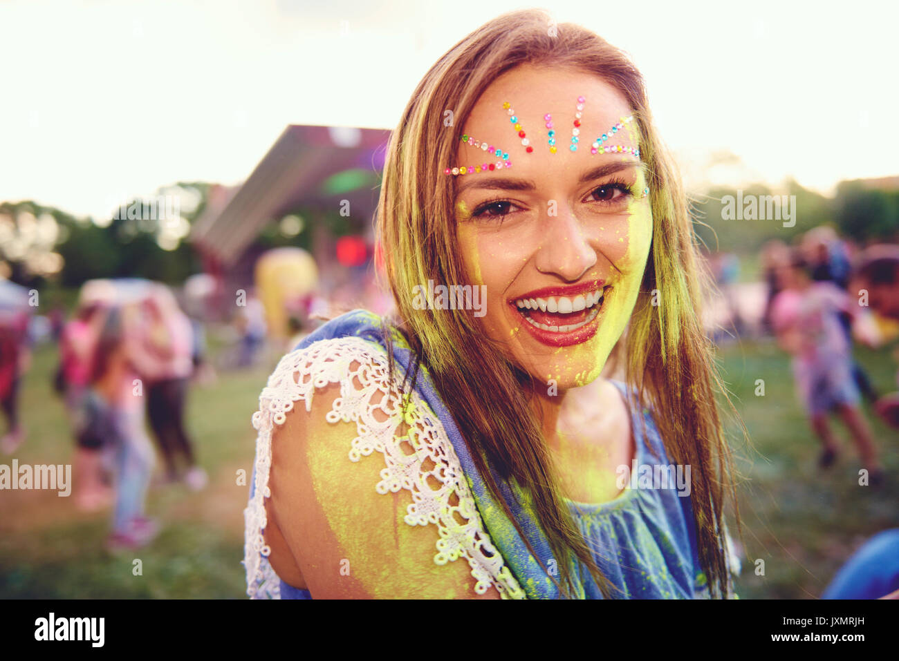 Portrait of young boho woman at festival Stock Photo