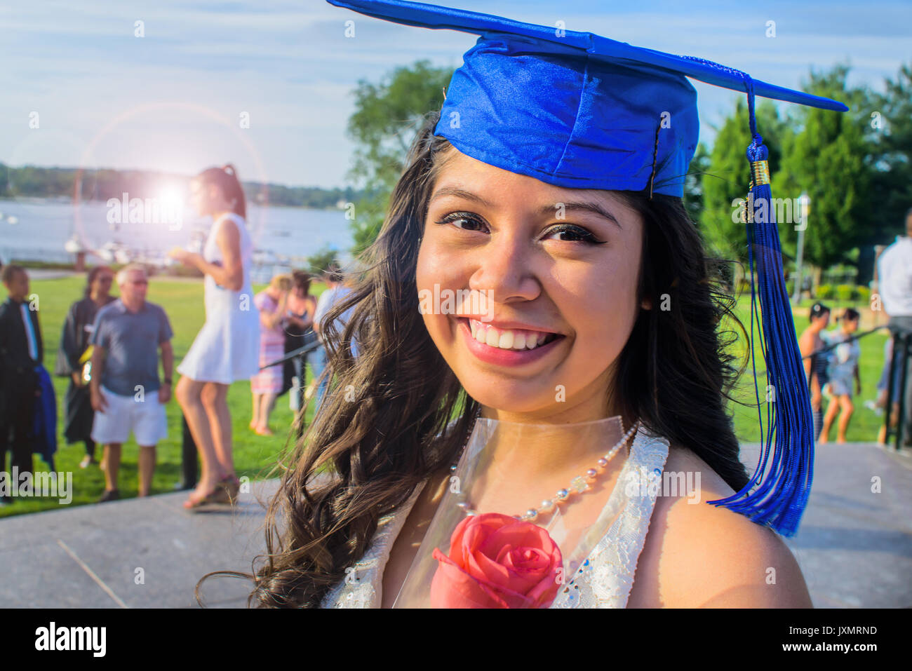 Portrait of teenage girl wearing graduation cap Stock Photo