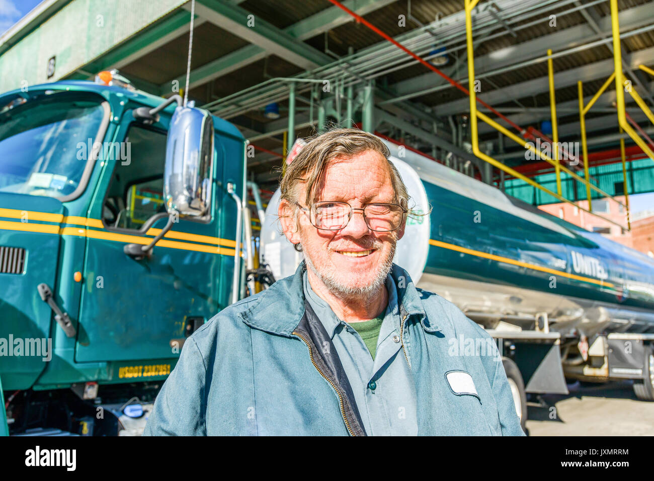 Portrait of male trucker at biofuel industrial plant Stock Photo
