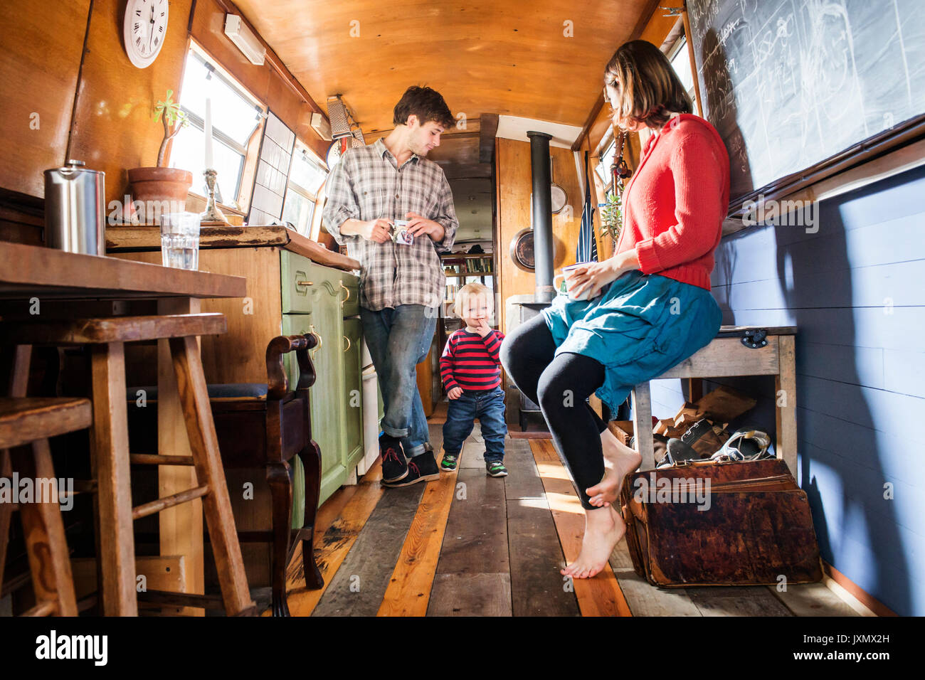 Family with baby boy living on barge Stock Photo Alamy