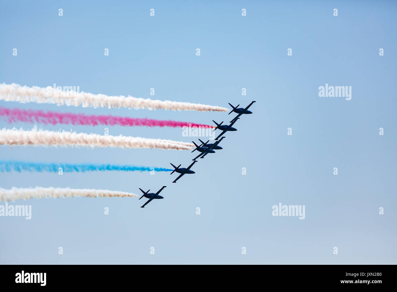 Color streams from engines during Airshow formation during Fleet Week in San Francisco Bay Stock Photo
