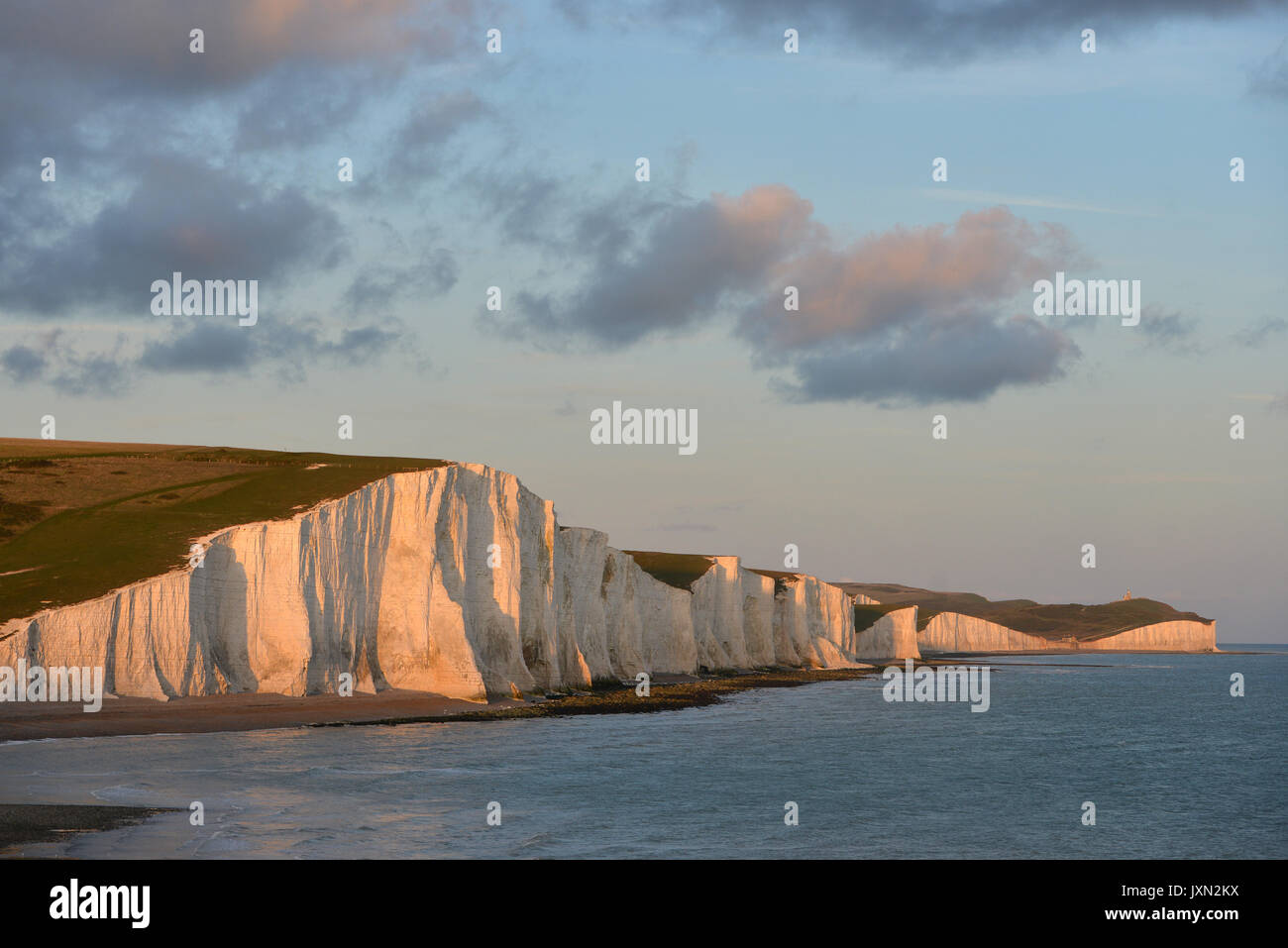Seven Sisters chalk cliffs at sunset. Stock Photo
