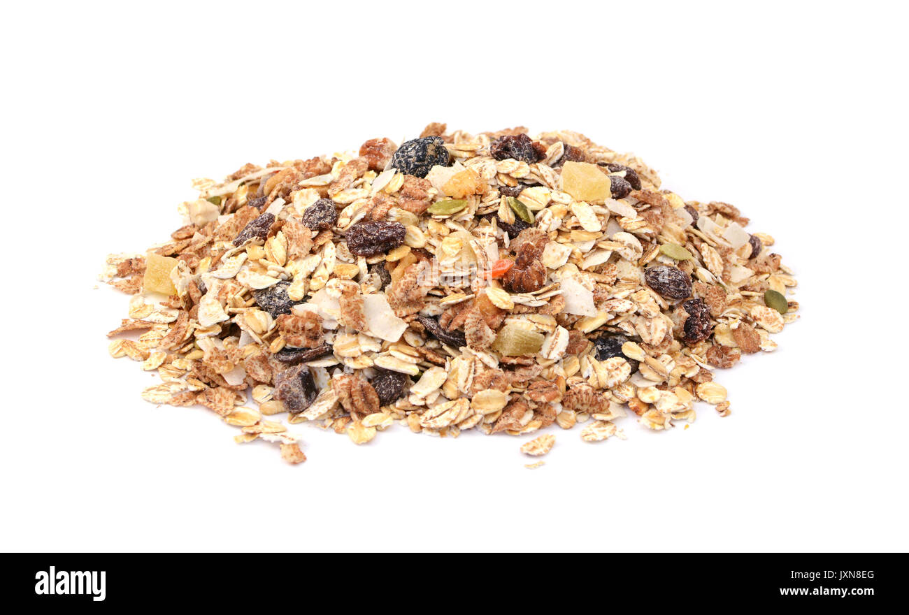 Muesli cereal flakes with seeds, mixed fruit and nuts, isolated on a