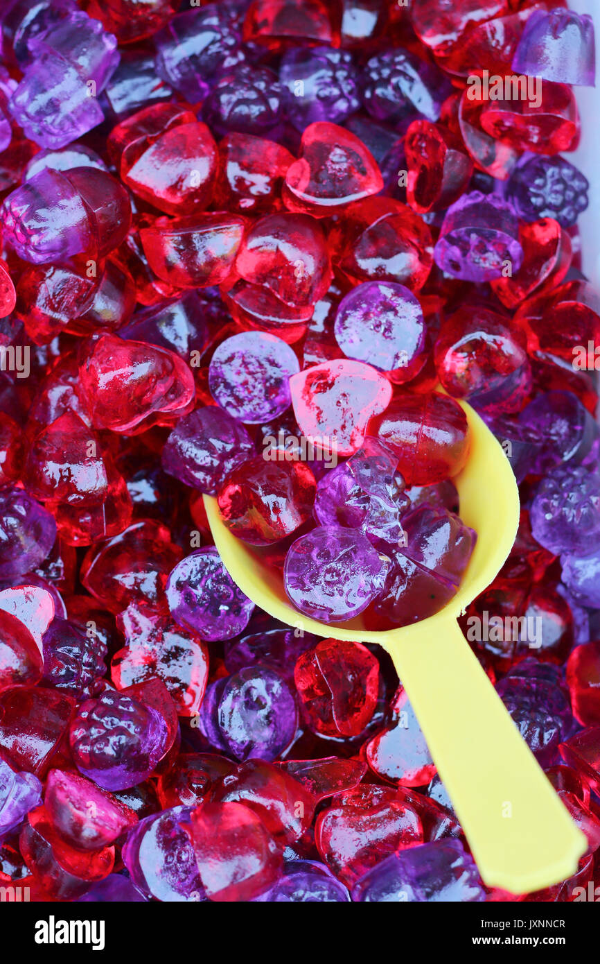red and purple sweet gummy closeup Stock Photo