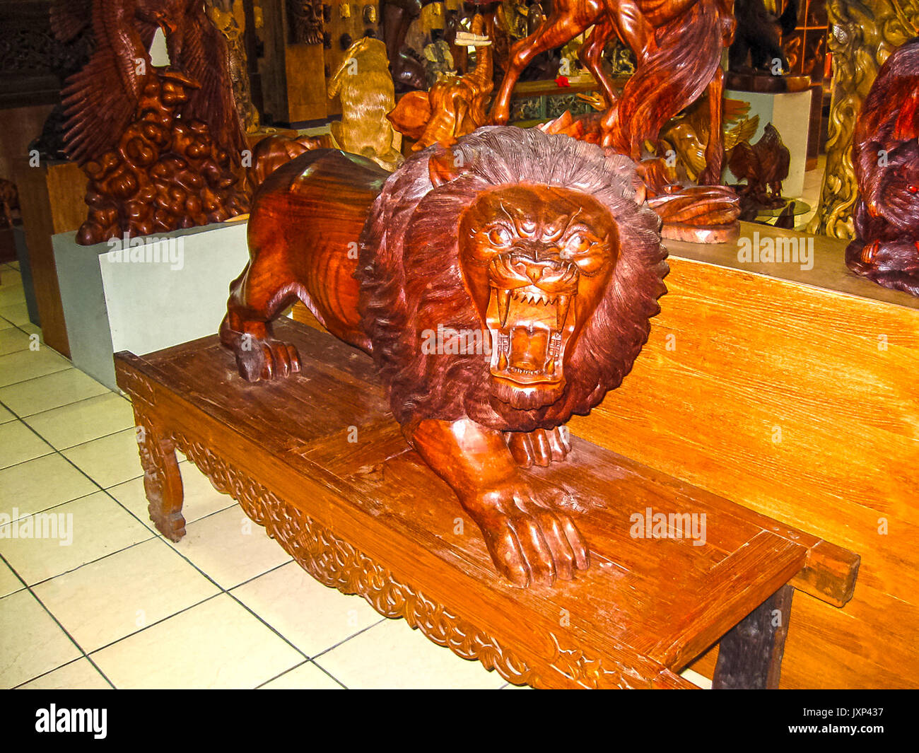 Ubud, Indonesia - April 12, 2012: Carved wooden animal statues in shop Stock Photo