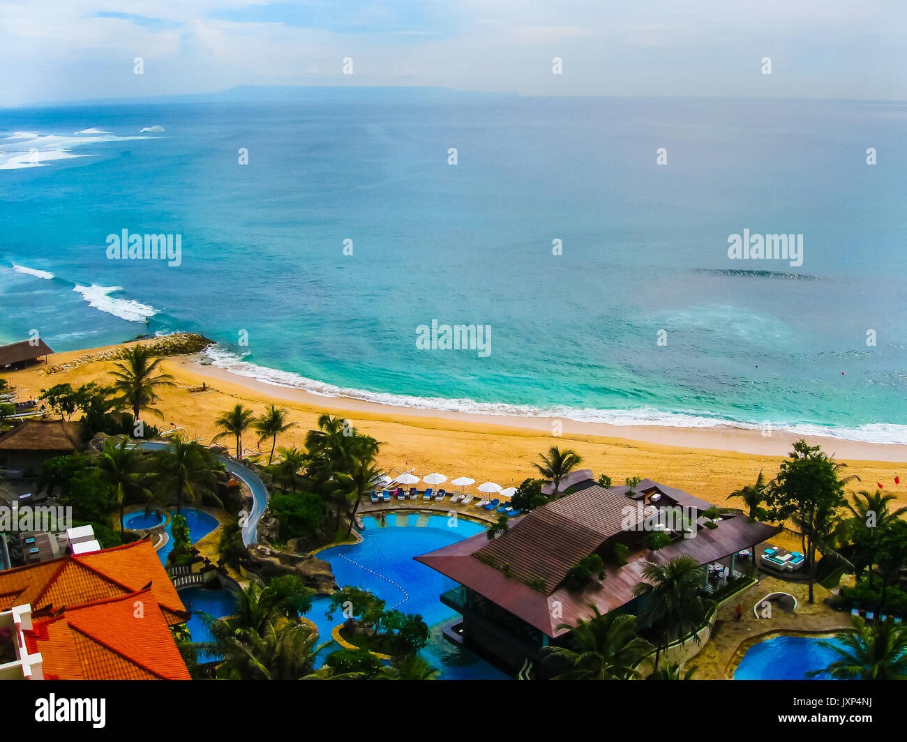 Bali, Indonesia - December 30, 2008: The beach of ocean and Nusa Dua Grand Nikko hotel Stock Photo