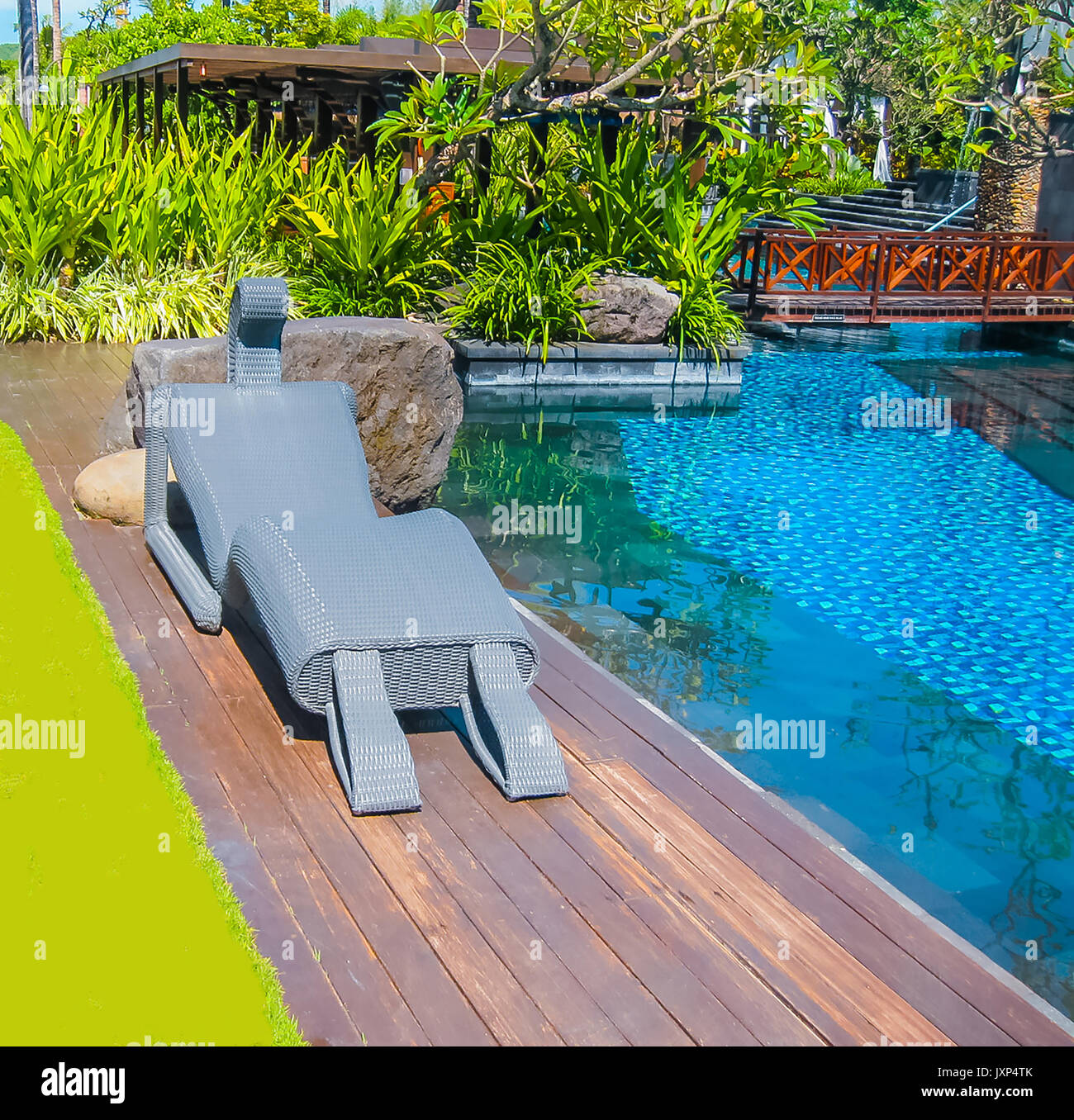 Bali, Indonesia - April 14, 2014: View of swimming pool at St. Regis ...