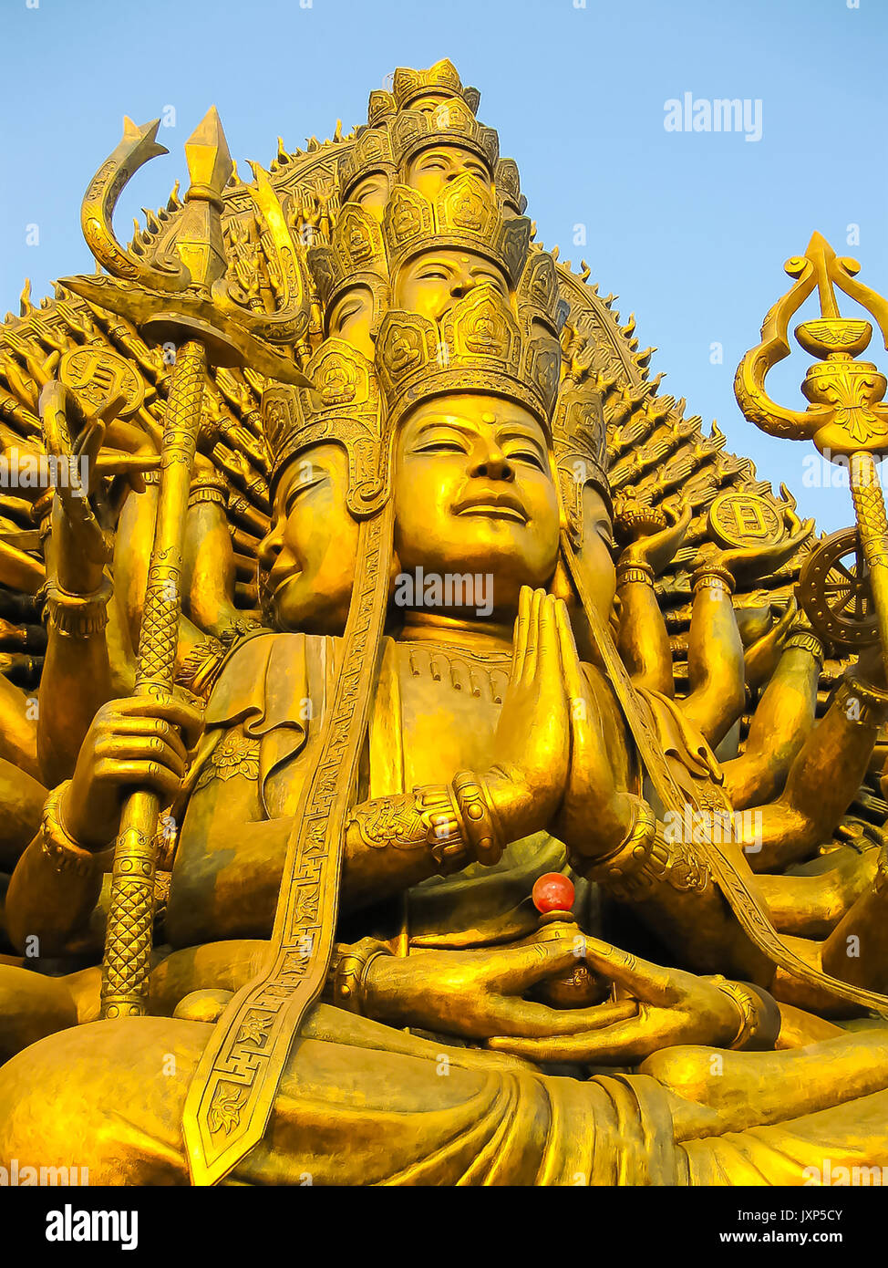 Buddha statue on a blue sky background Stock Photo - Alamy