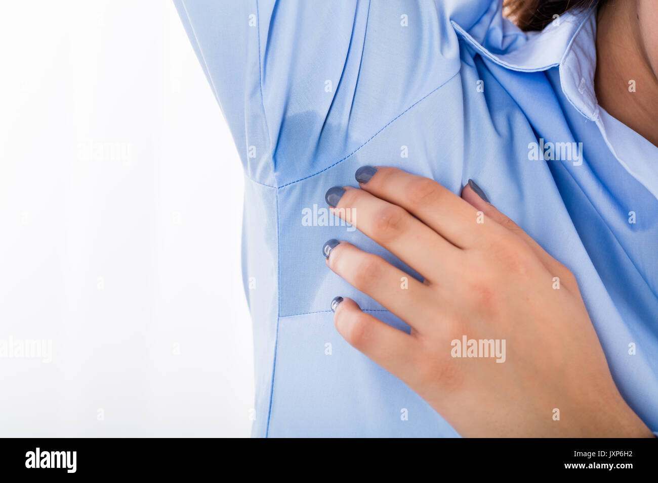Closeup Of Young Woman Notices Her Sweat Under Armpit Stock Photo Alamy