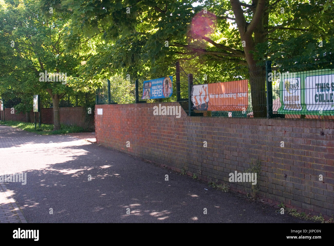 View of wall surrounding Bradwell Village School, Bradwell, Milton Keynes Stock Photo Alamy