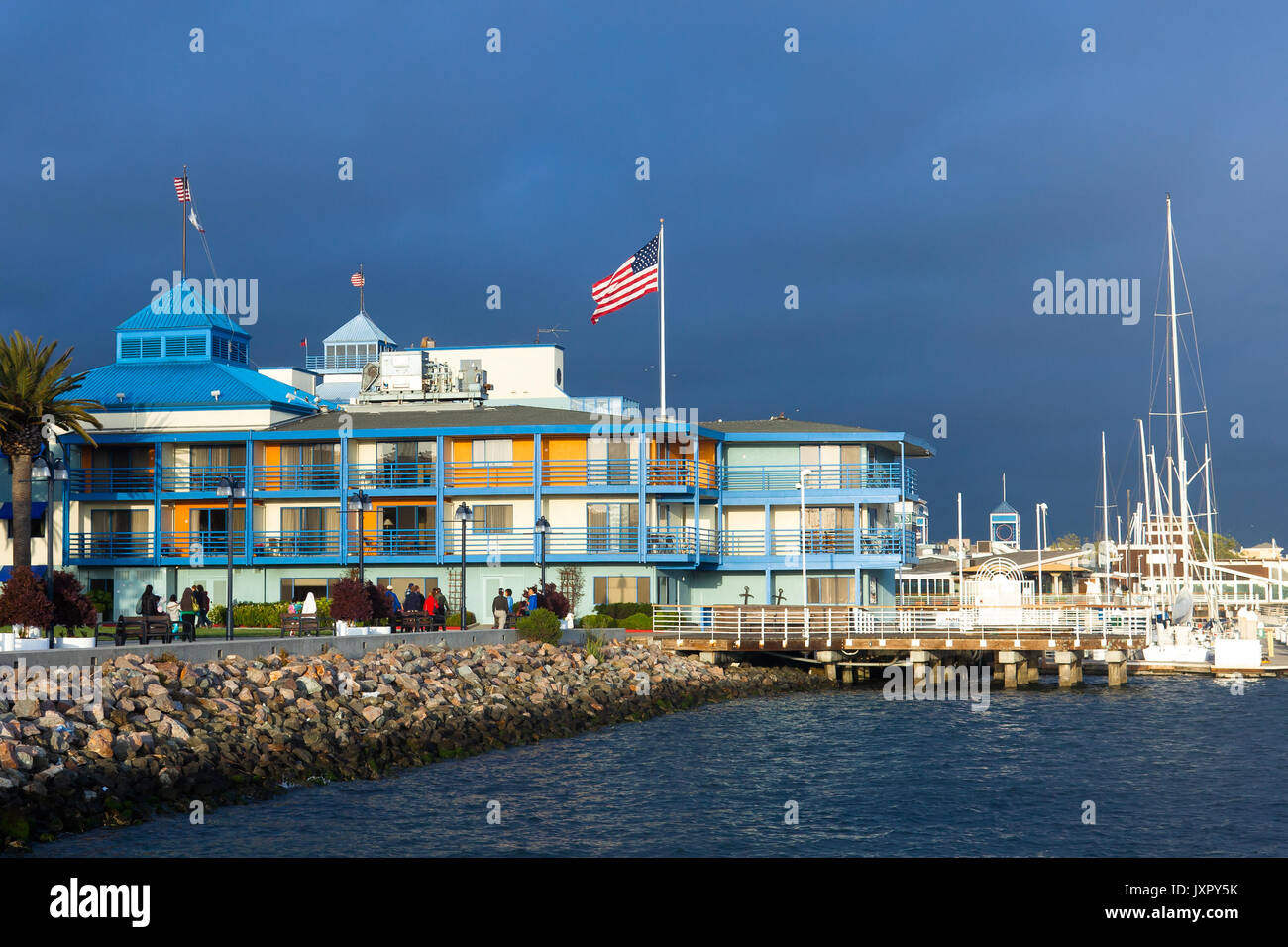 Oakland, California waterfront marina buildings and boats at sunset. Jack London Square area Stock Photo