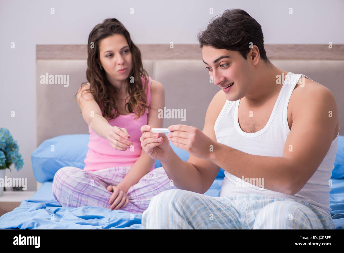 Young Family With Pregnancy Test Results Stock Photo Alamy