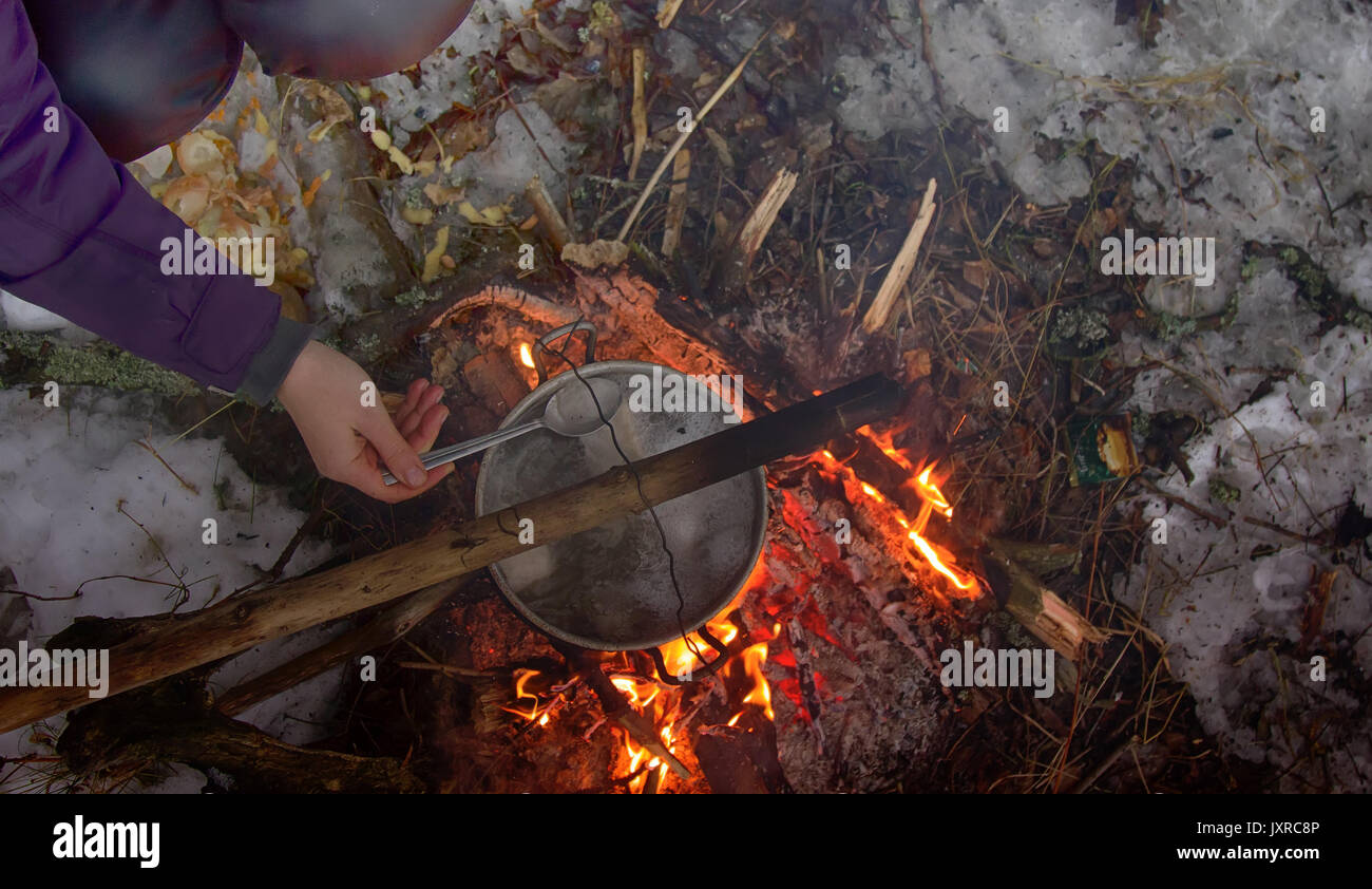 picnic in winter on nature of a bonfire. cooking in the campaign Stock ...