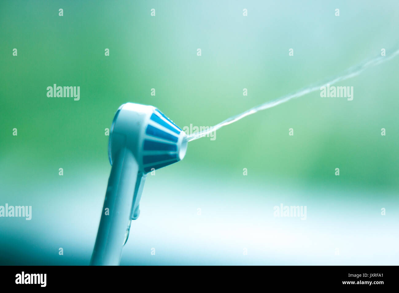 Dental water spray cleaner for interdental hygiene Stock Photo Alamy