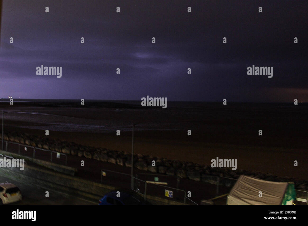Morecambe, Lancashire, UK. 17th August, 2017. Sheet lightning illuminates Morecambe Bay this morning Credit: David Billinge/Alamy Live News Stock Photo