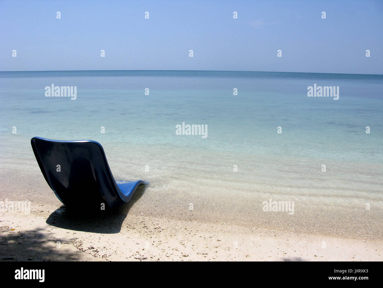 Chair blue on a nice beach Stock Photo