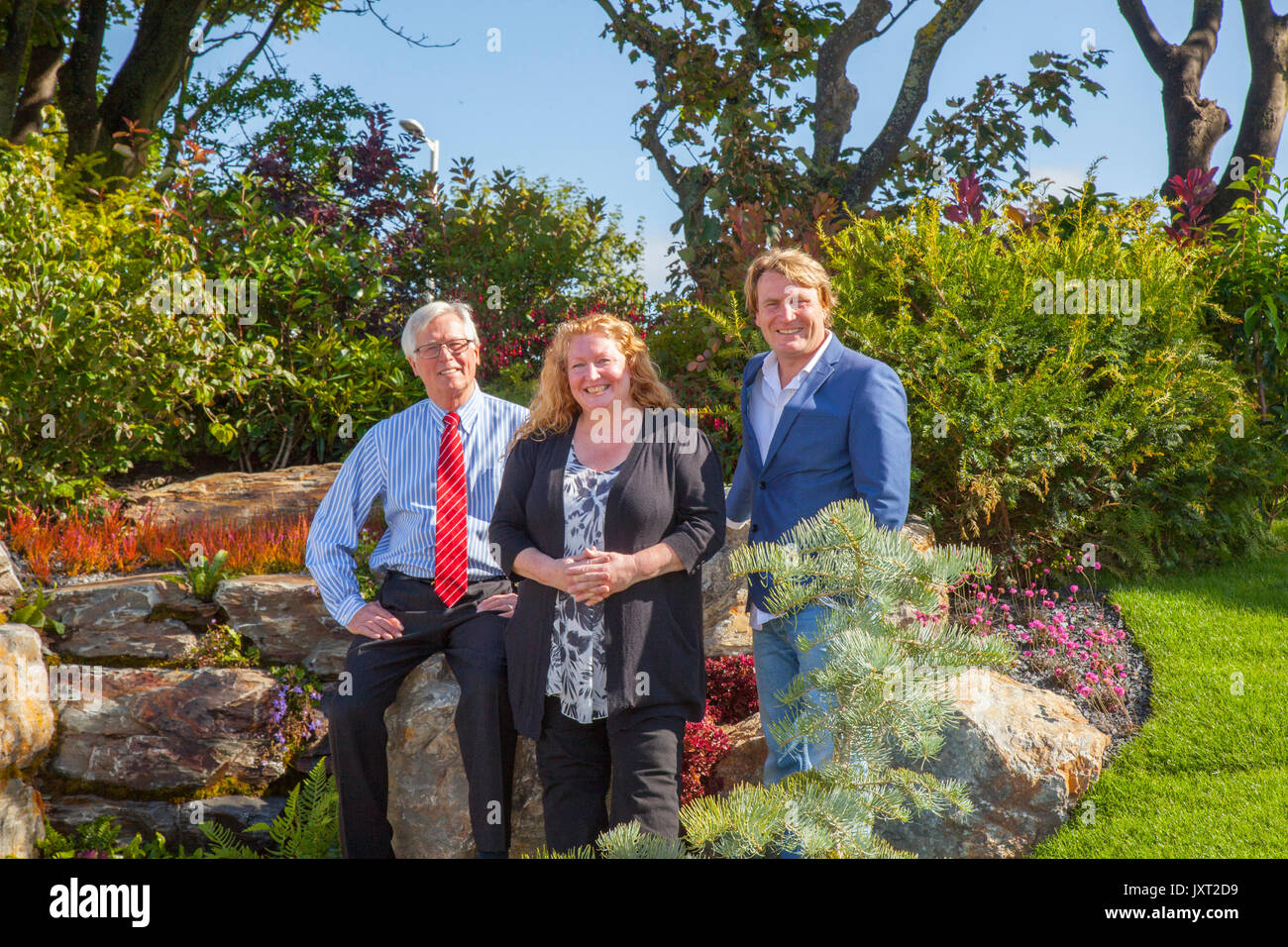 David Domoney, Charlie Dimmock, & John Craven at the Opening day at Southport Flower Show as TV presenters, garden designers, and floral experts, professional gardeners await the arrival of up to 80,000 visitors who are expected to attend to this famous annual event. Stock Photo