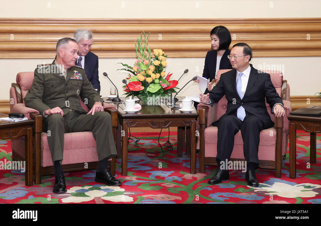Beijing, China. 17th Aug, 2017. Chinese State Councilor Yang Jiechi (R) meets with Chairman of the U.S. Joint Chiefs of Staff Joseph Dunford in Beijing, capital of China, Aug. 17, 2017. Credit: Xie Huanchi/Xinhua/Alamy Live News Stock Photo