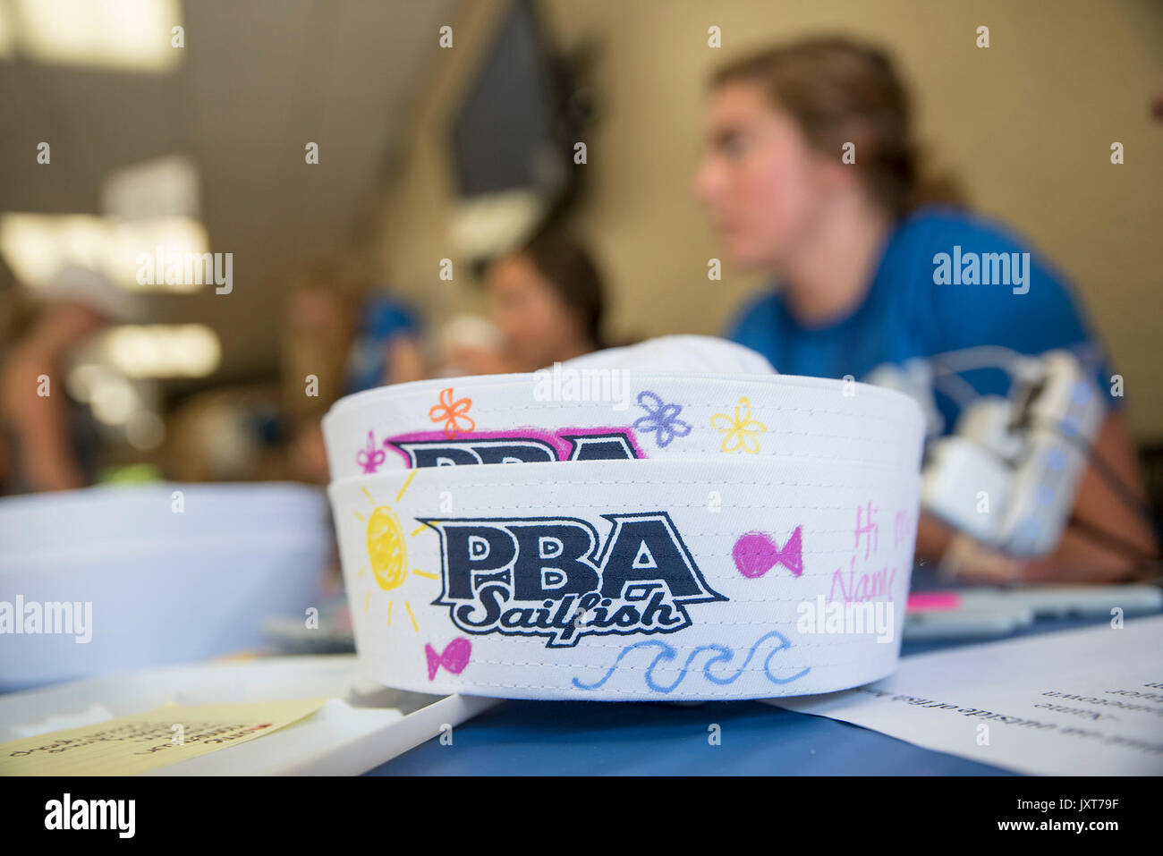 August 17, 2017 - West Palm Beach, Florida, U.S. - A Palm Beach Atlantic University ''fish,'' hat is seen on a table during move-in day at Palm Beach Atlantic University in West Palm Beach, Fla., on Thursday, August 17, 2017. At PBA, incoming freshman traditionally wear the hats, which are decorated with the student's information like age or major, during their first week at school. Of the approximately 740 incoming new students, about 700 will live on-campus in residence halls. (Credit Image: © Andres Leiva/The Palm Beach Post via ZUMA Wire) Stock Photo