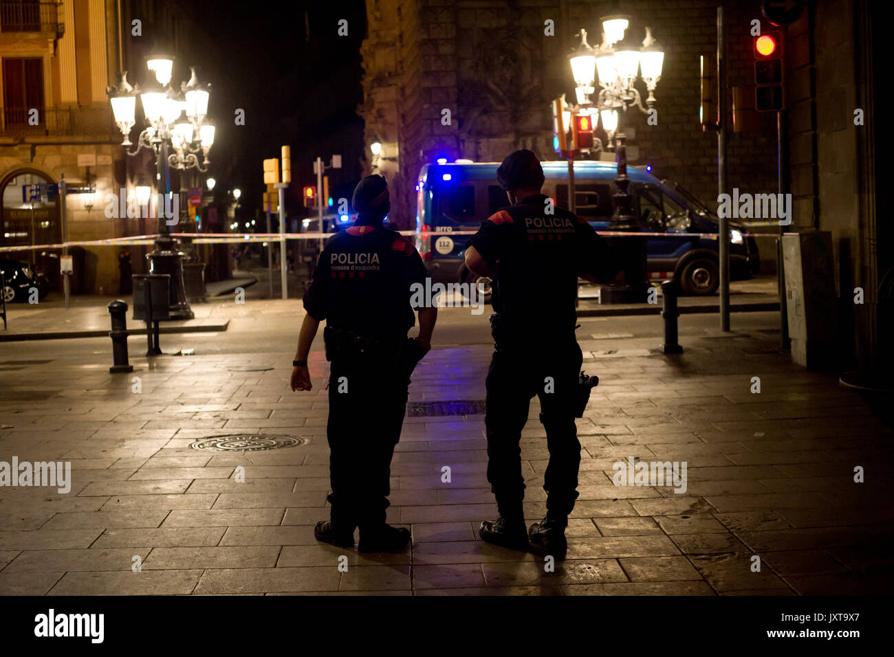 Barcelona, Catalonia, Spain. 17th Aug, 2017. Police officers patrol Las Ramblas area of Barcelona where there has been a terrorist attack. Thirteen people are dead and at least 50 injured after a van rammed into the crowd of Las Ramblas street in Barcelona. Credit: Jordi Boixareu/ZUMA Wire/Alamy Live News Stock Photo