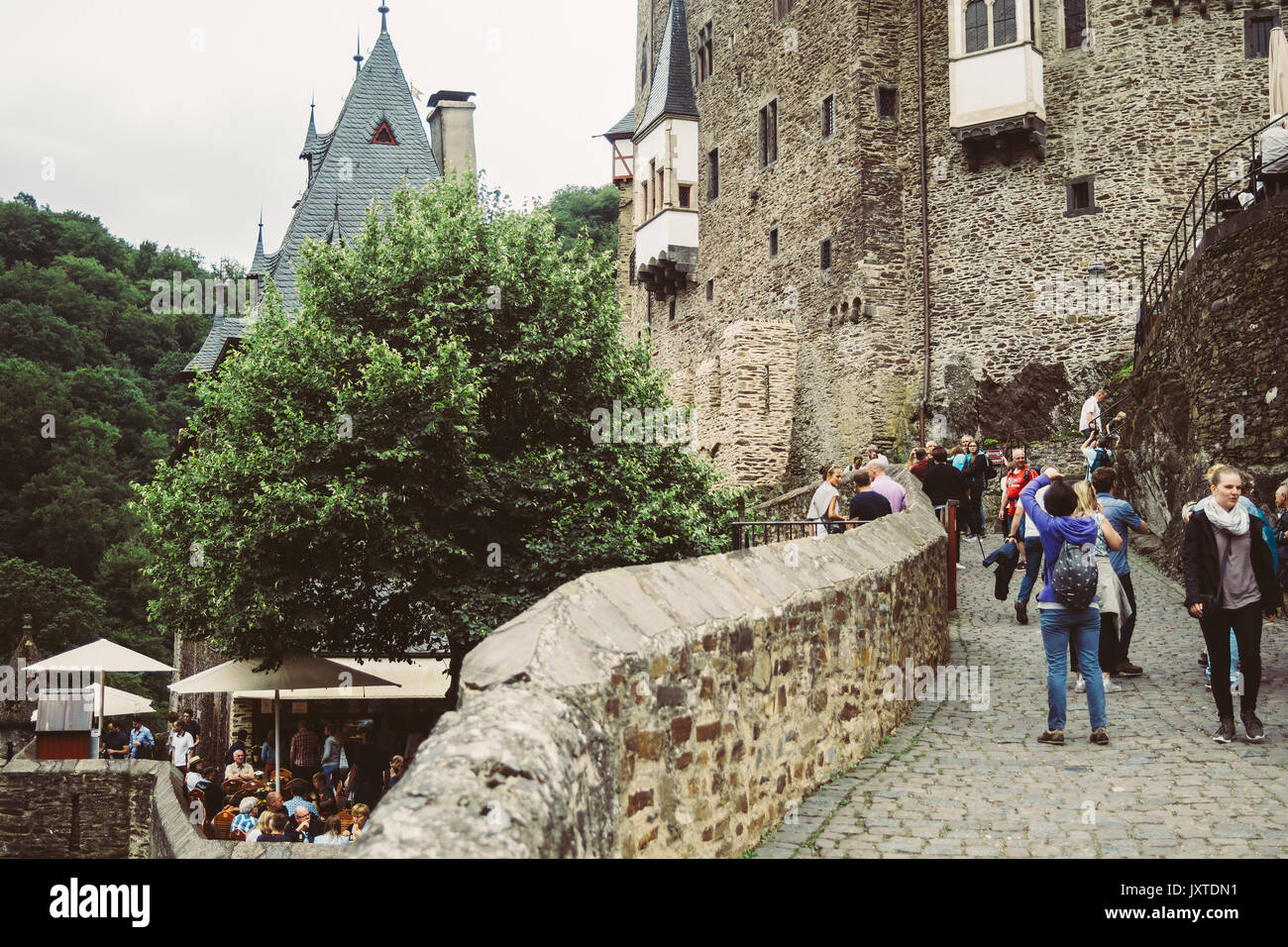 Tourists visiting the Burg Eltz castle in Wierschem, Germany. Stock Photo