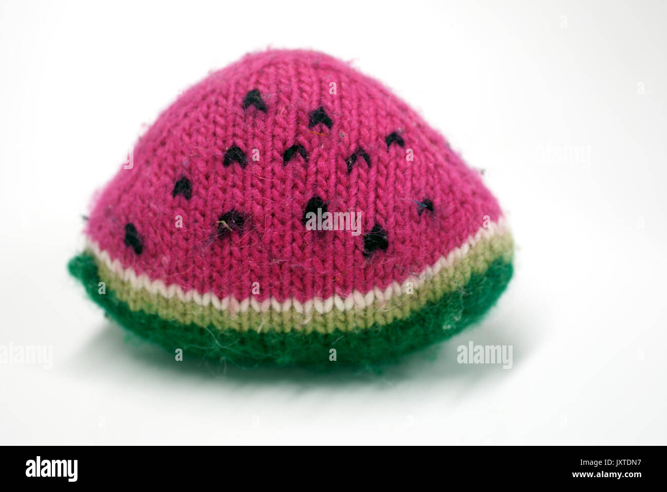 Hand knit plush toy slice of watermelon Stock Photo