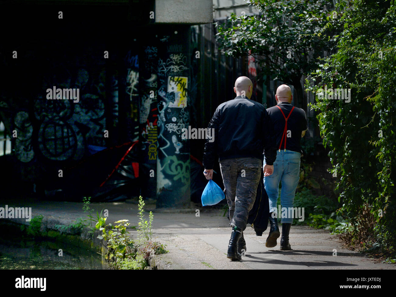 Two skinheads walking near Camden, London Stock Photo