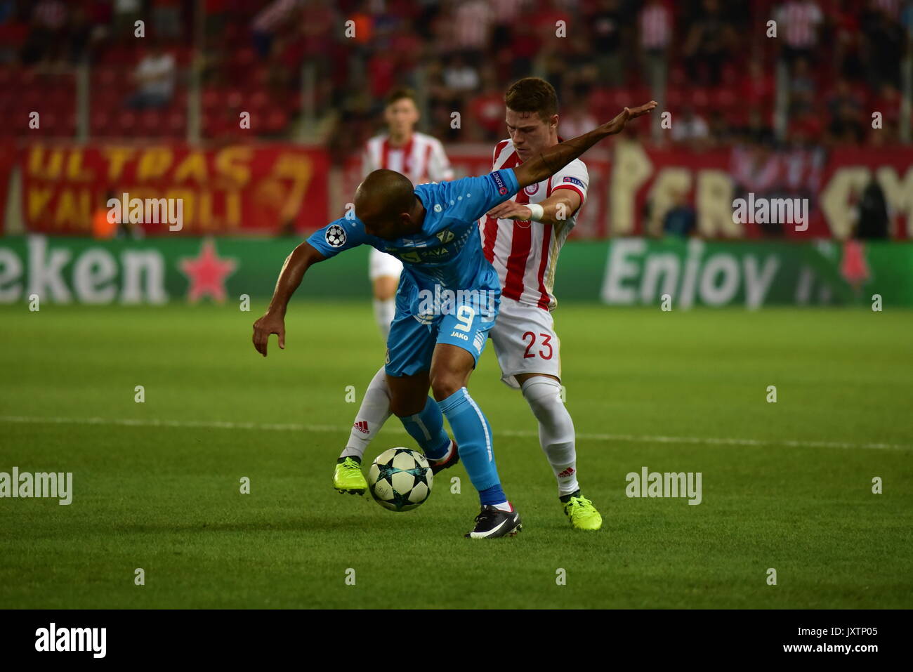 Piraeus, Greece. 16th Aug, 2017. Heber (no 9) of HNK Rijeka tries to avoid  Leonardo Kourtis (no 23) of Olympiacos. Olympiacos manage to win 2-1  against HNK Rijeka in the first game