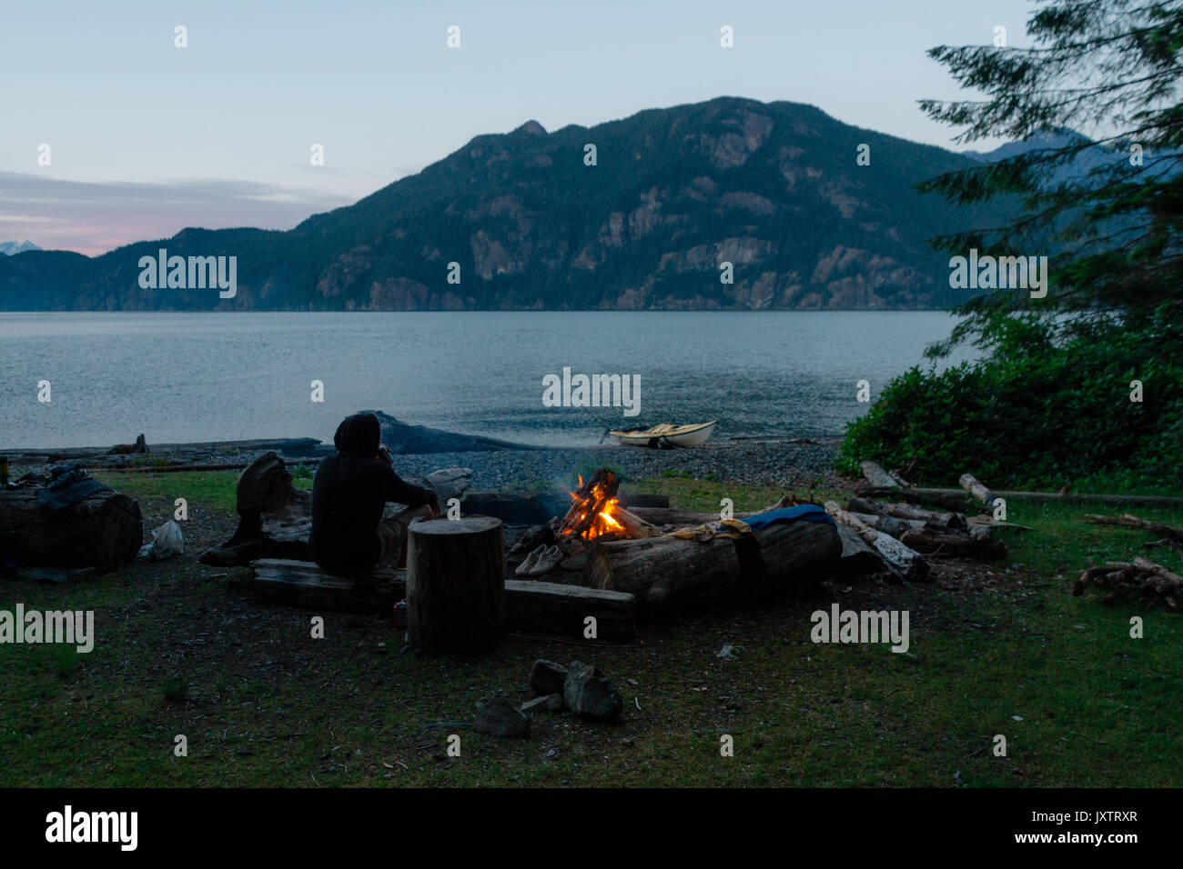 Lonely man on beach hi-res stock photography and images - Alamy