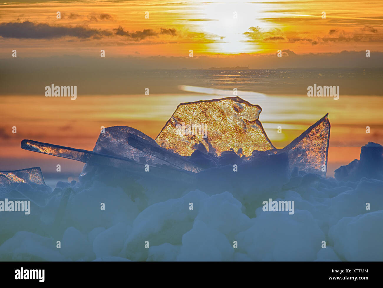 Joyful mood. Spring sparkles and shines on melting ice. Sun hits eye ...