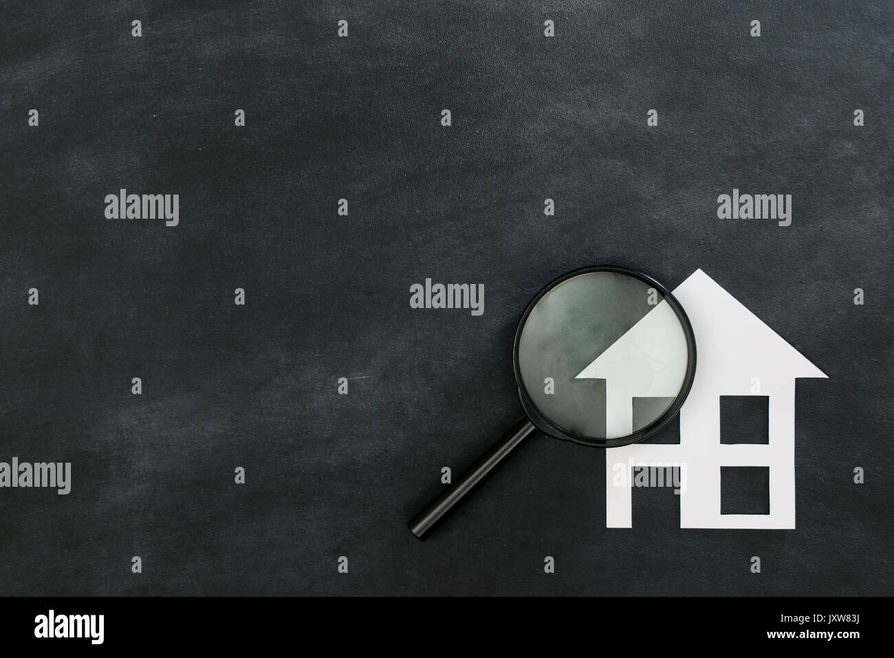 magnifier searching new house concept isolated on chalkboard background ...