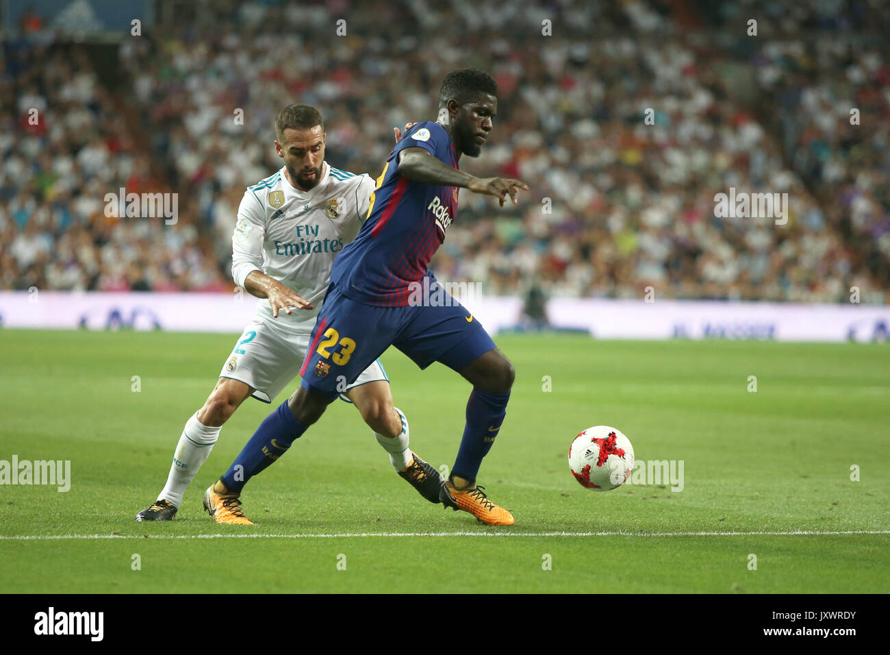 Samuel Umiti and Dani Carvajal. Real Madrid defeated Barcelona 2-0 in the second leg of the Spanish Supercup football match at the Santiago Bernabeu s Stock Photo