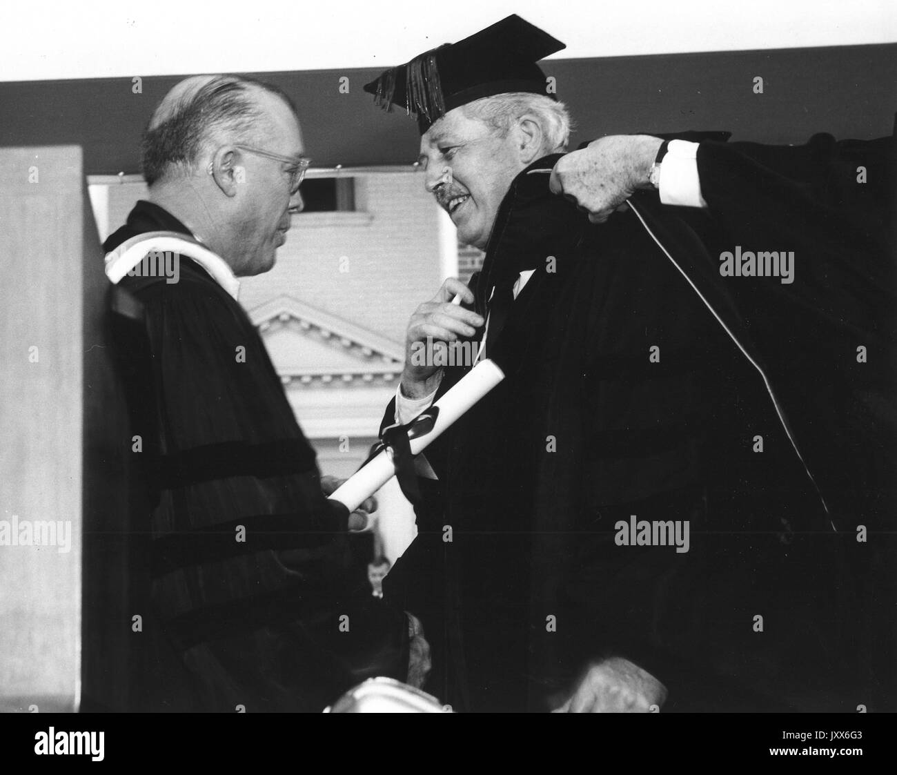 Commencement, Milton Stover Eisenhower, Harold Macmillan, Eisenhower presenting honorary degree to Macmillan, 1958. Stock Photo